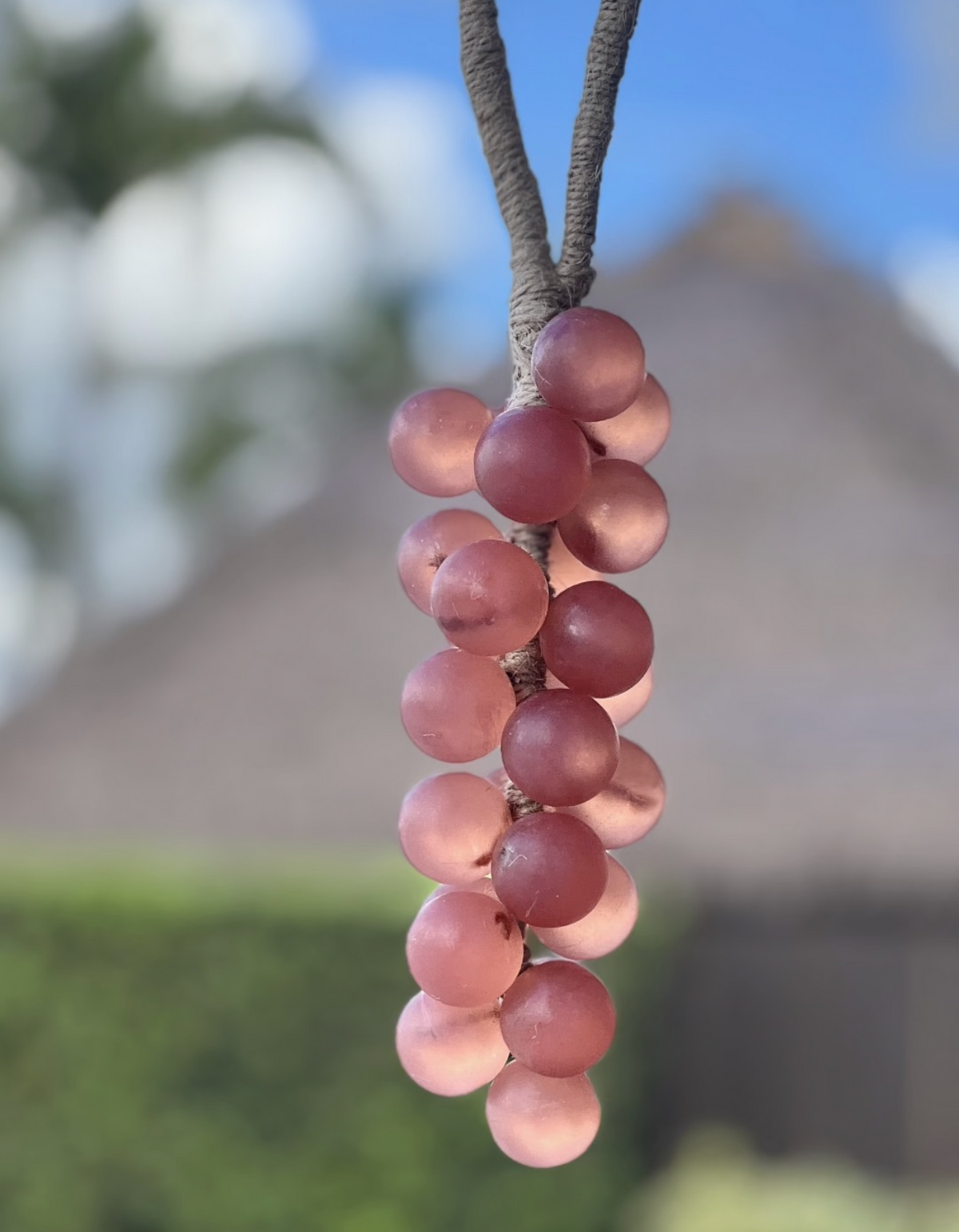 A grape cluster style soap hanging. pink color