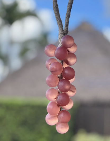 A grape cluster style soap hanging. pink color